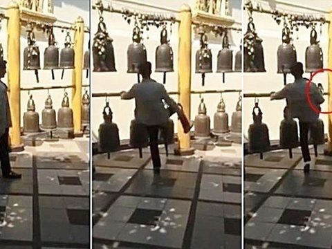 Chinese Tourist Filmed Kicking Chiang Mai Temple Bell VIDEO