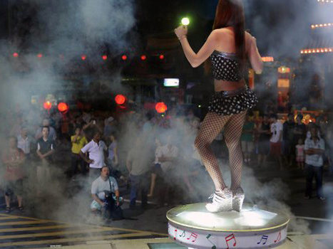 China vows crackdown on strippers at funerals